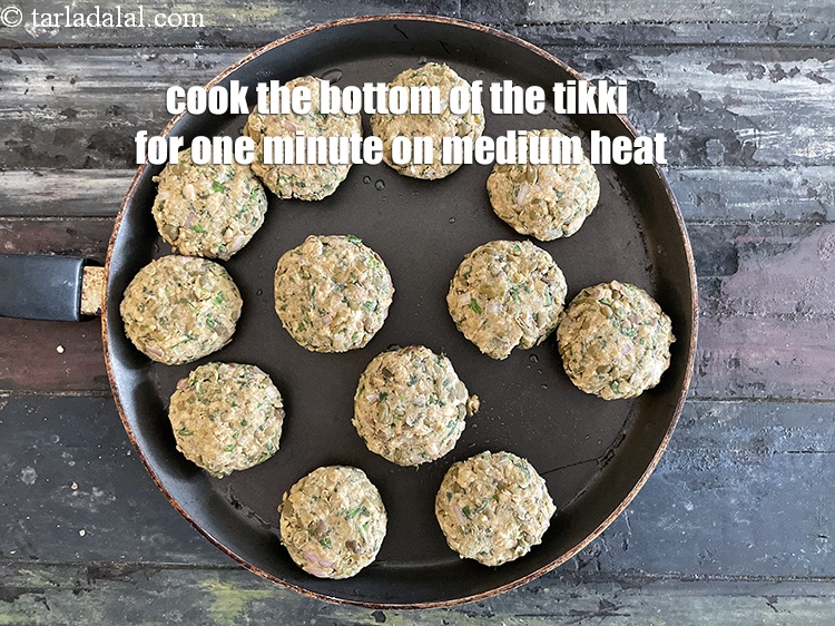 Step 35 – <meta charset="UTF-8" /> Cook the bottom of the tikki for about one minute on medium …