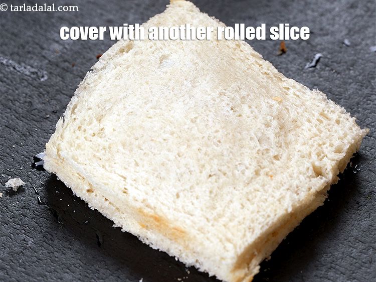 Step 20 – Cover with another rolled bread slice.<br /> &nbsp;