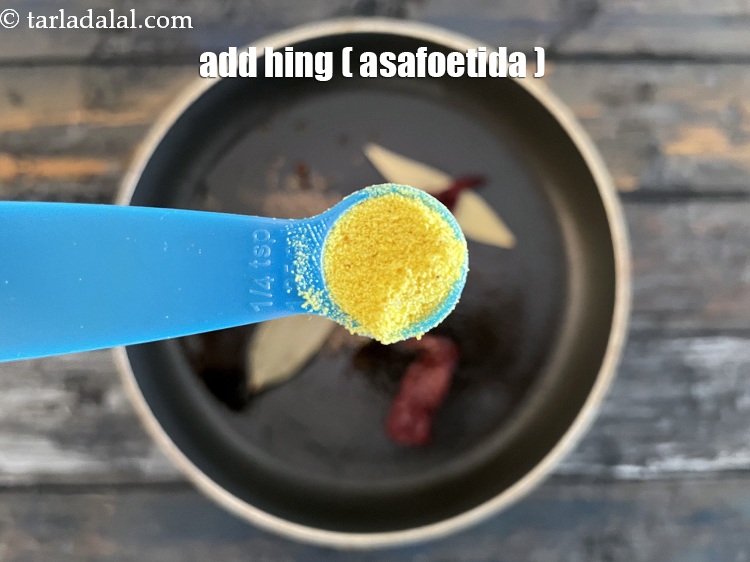 Step 20 – Add&nbsp;<meta charset="UTF-8" /><strong>1/4&nbsp;tsp&nbsp;</strong><a href="glossary-asafoetida-hing-113i">asafoetida (hing)</a>.