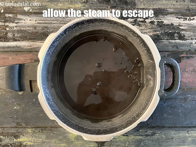Step 15 – Allow the steam to escape before opening the lid.