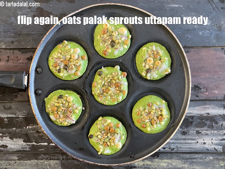 Step 27 – Flip again and your&nbsp;<strong>oats palak sprouts uttapam</strong> are ready.