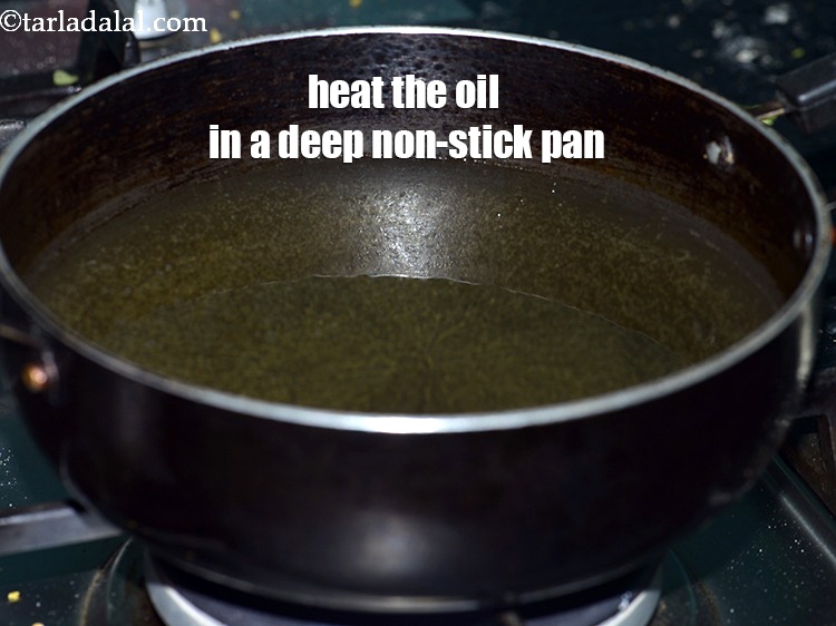 Step 22 – Heat the oil in a deep non-stick pan.
