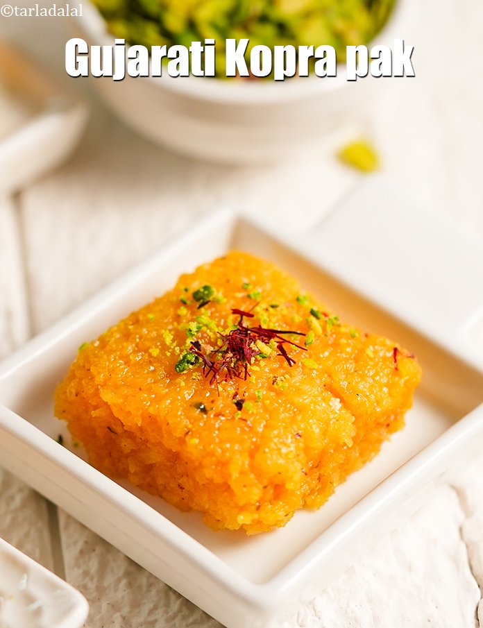 Step 25 – Garnish <strong>Kopra pak | Gujarati&nbsp;Kopra pak |&nbsp;Kopra pak made with mava (khoya)</strong> | with almond …