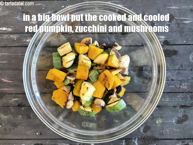 Step 24 – In a big bowl put the cooked and cooled&nbsp;red pumpkin,&nbsp;zucchini and mushrooms.