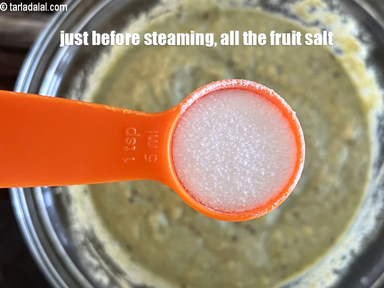 Step 29 – <meta charset="UTF-8" />Just before steaming, sprinkle 2 tsp fruit salt on the batter.
