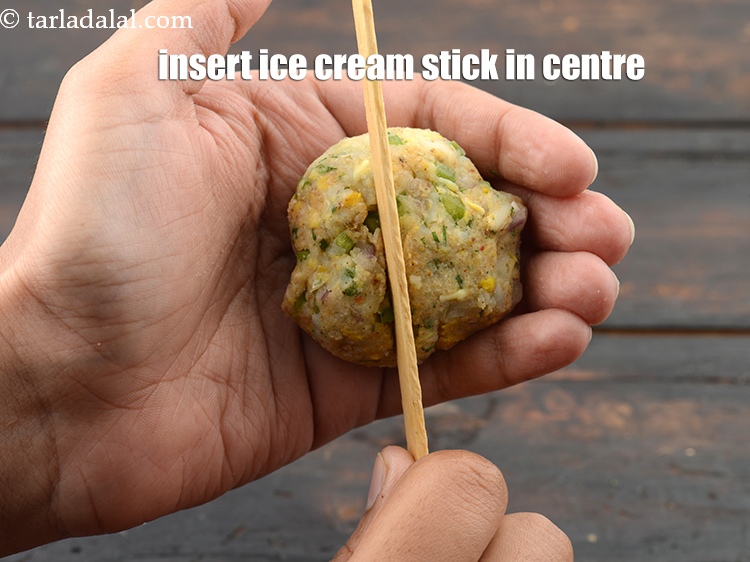 Step 20 – Insert the ice cream stick in the centre.