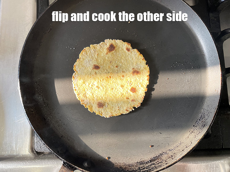 Step 24 – Flip and cook the&nbsp;<strong>Khakhra</strong>&nbsp;on the other side. Cook on slow flame to get a crisp …