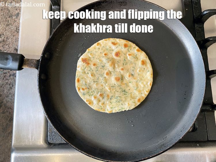 Step 22 – You will have to keep cooking the khakhra and flipping it till done.