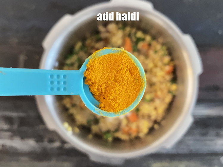Step 36 – Add&nbsp;<meta charset="UTF-8" />1/2 tsp&nbsp;<a href="glossary-turmeric-powder-haldi-645i">turmeric powder (haldi)</a>.