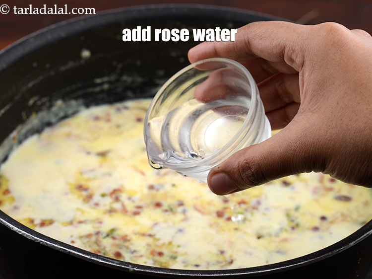 Step 20 – Add 1 tsp&nbsp;<a href="https://www.tarladalal.com/glossary-rose-water-gulab-jal-649i">rose water</a>.