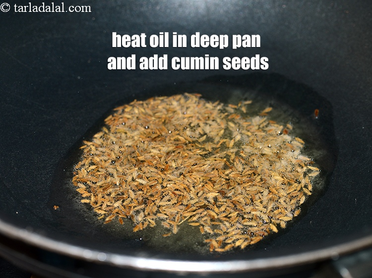 Step 21 – Heat the oil in a deep pan and add the cumin seeds.