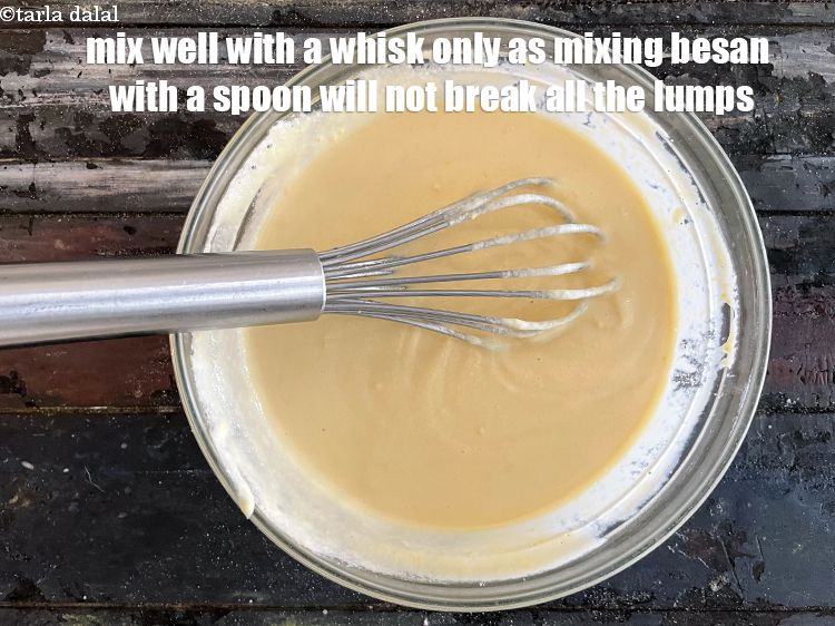 Step 21 – Mix very well till no lumps remain. <u><em>Use a whisk to mix as the besan …