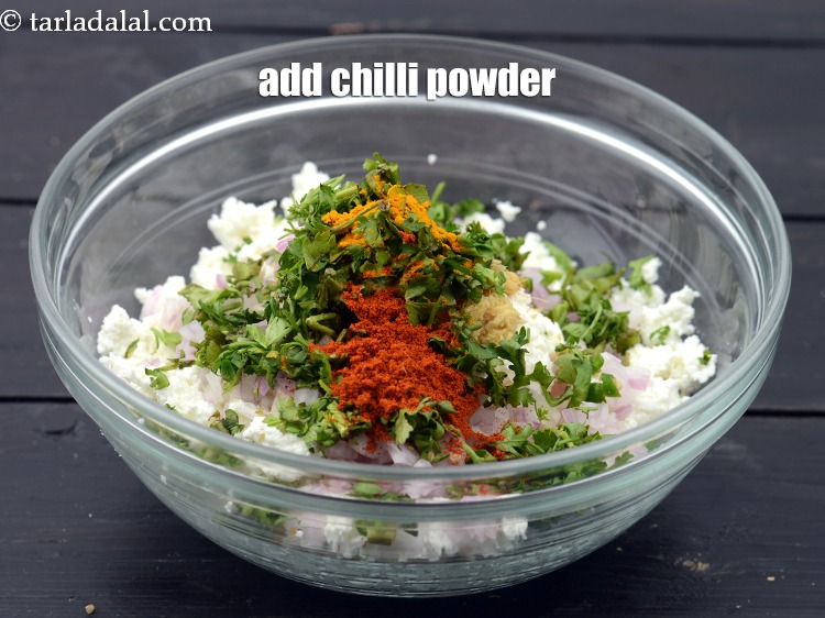 Step 22 – Add &frac12; tsp <a href="https://www.tarladalal.com/glossary-chilli-powder-red-chilli-powder-339i">chilli powder</a>.