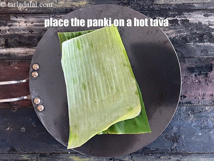 स्टेप 23 – गरम तवे पर रखें।