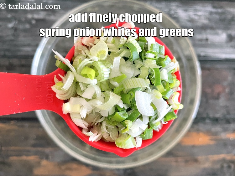 Step 21 – Add&nbsp;<meta charset="UTF-8" />1/4 cup&nbsp;finely&nbsp;chopped spring onions&nbsp;(whites and greens).