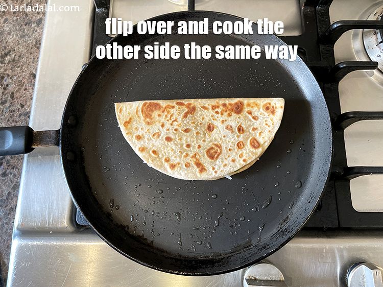 Step 42 – Flip over and cook the other side of the paratha the same way.