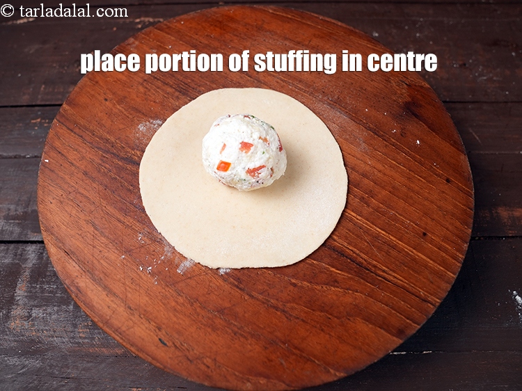 Step 20 – Place a portion of the stuffing in the centre of a circle.