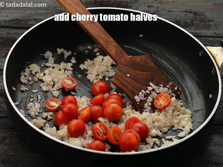 Step 20 – Add 1/4 cup&nbsp;<a href="https://www.tarladalal.com/glossary-cherry-tomato-halves-2464i">cherry tomato halves</a>. This gives the best taste.&nbsp;