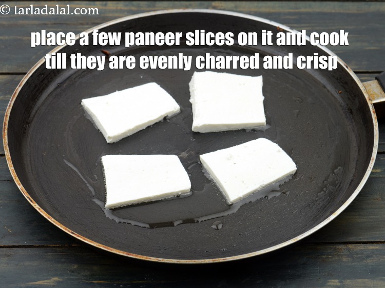 Step 21 – Once hot, place a few paneer slices on it&nbsp;and cook on other side till they …