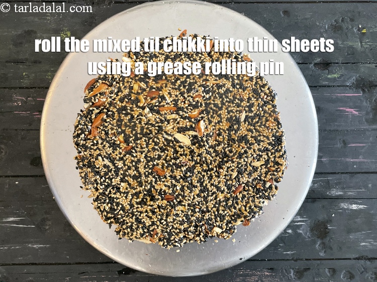 Step 19 – Roll the chikki out into thin sheets using a greased rolling pin.
