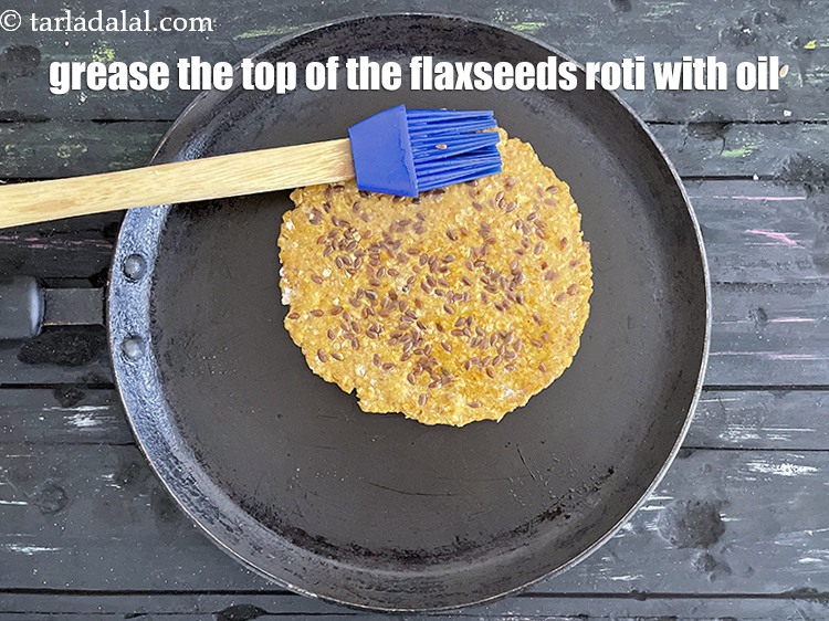 Step 23 – Grease the top of the roti with oil.