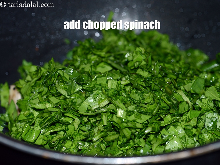 Step 21 – Add 2 cups <a href="https://www.tarladalal.com/glossary-chopped-spinach-780i">chopped spinach (palak)</a>.