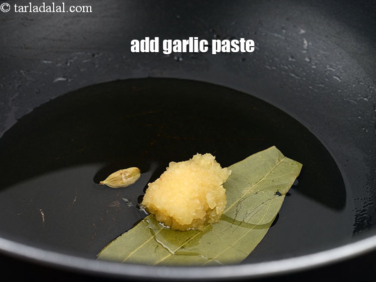 Step 20 – Add 1 tsp <a href="https://www.tarladalal.com/glossary-garlic-paste-lehsun-ki-paste-lahsun-ki-paste-350i">garlic (lehsun) paste</a>. Jain&rsquo;s can skip garlic.