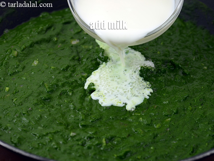 Step 20 – Add 1 cup <a href="https://www.tarladalal.com/glossary-milk-doodh-full-cream-milk-514i">milk</a>.