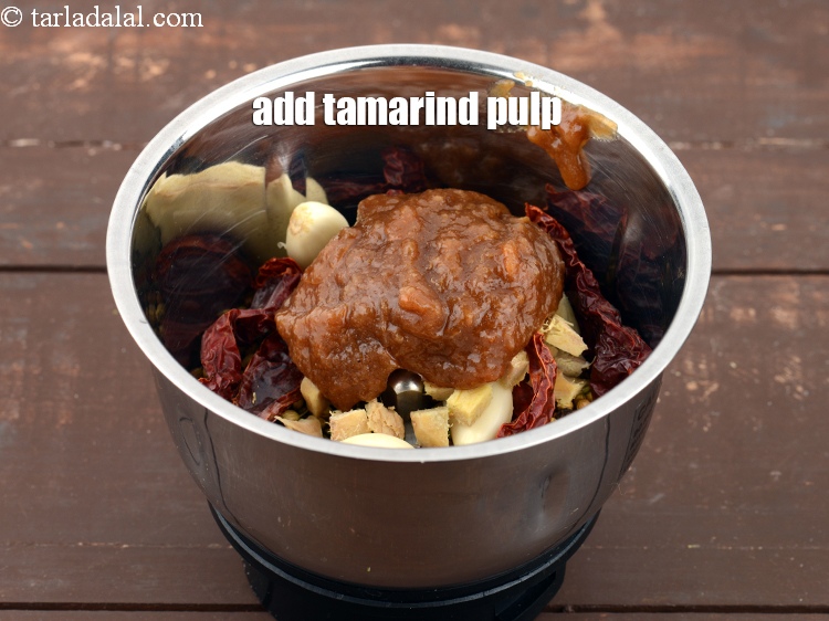 Step 21 – Add 2 tbsp <a href="https://www.tarladalal.com/glossary-tamarind-pulp-tamarind-extract-imli-ka-pulp-838i">tamarind (imli) pulp</a>.