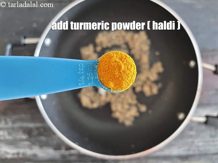 Step 27 – Add&nbsp;<meta charset="UTF-8" />1/4 tsp&nbsp;<a href="glossary-turmeric-powder-haldi-645i">turmeric powder (haldi)</a>.
