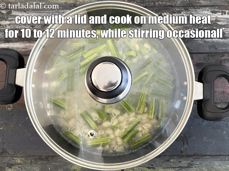 Step 25 – Cover with a lid and cook on a medium flame for 10 to 12 minutes, …