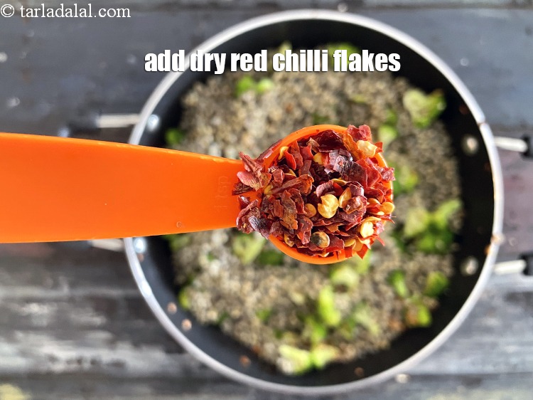 Step 27 – Add<strong> 1/2 tsp</strong>&nbsp;<a href="glossary-dry-red-chilli-flakes-paprika-338i">dry red chilli flakes (paprika)</a>.