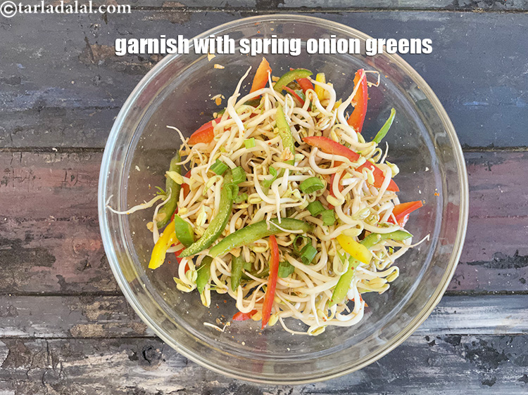 Step 23 – Garnish with <meta charset="UTF-8" />1 tbsp&nbsp;finely&nbsp;<a href="glossary-chopped-spring-onion-greens-1030i">chopped spring onion greens</a>.