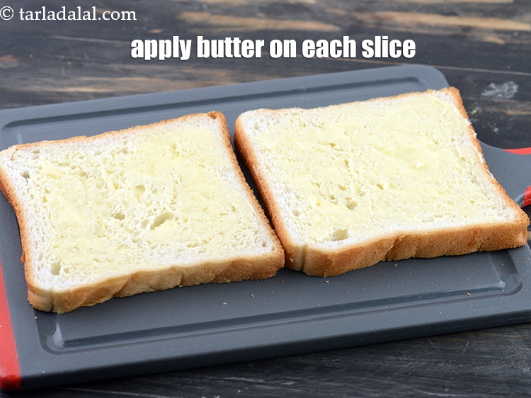 Step 19 – Apply 1 tsp butter on each slice of the bread.