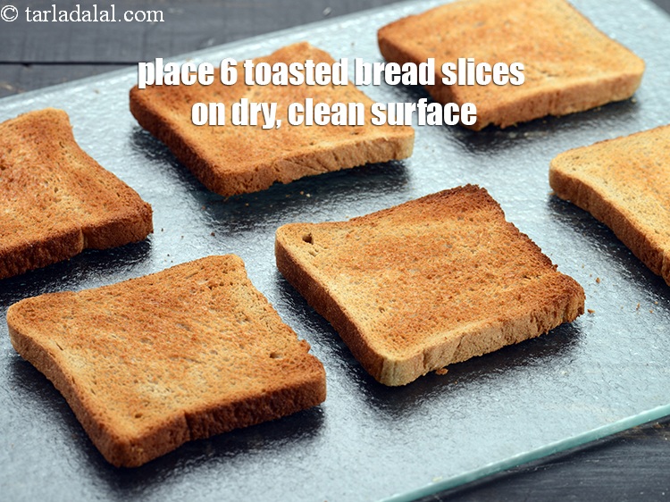 Step 19 – Place 6&nbsp;<a href="https://www.tarladalal.com/glossary-toasted-whole-wheat-bread-slices-2238i">toasted whole wheat bread slices</a> on a dry, clean surface.&nbsp;