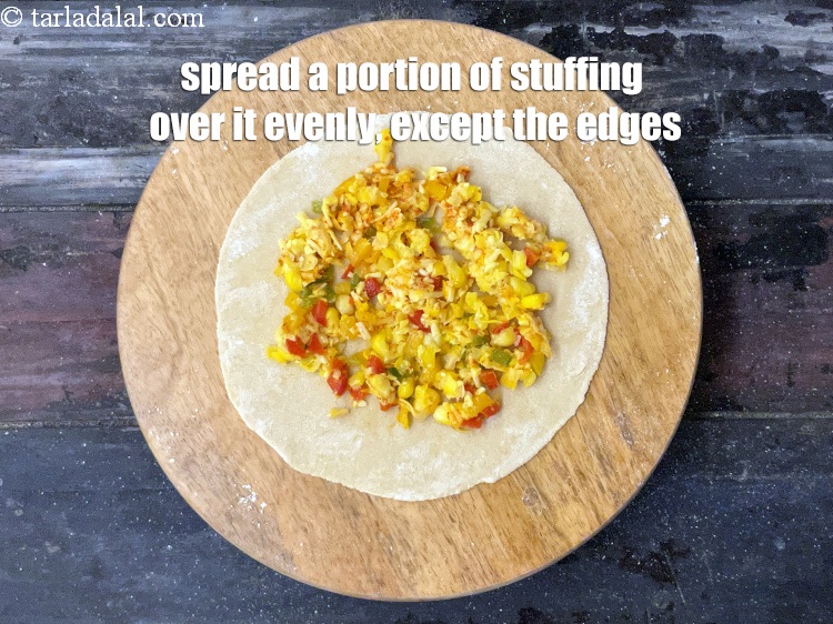 Step 28 – Spread a portion of the stuffing over it. Spread the stuffing evenly, except for the …