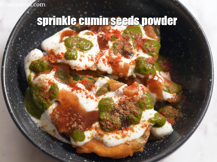 Step 20 – Sprinkle little <a href="https://tarladalal.com/glossary-cumin-seeds-powder-jeera-powder-zeera-powder-382i">cumin seeds (jeera) powder</a>.