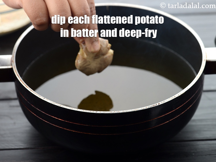 Step 20 – Dip each flattened potato in the prepared batter and deep-fry them.