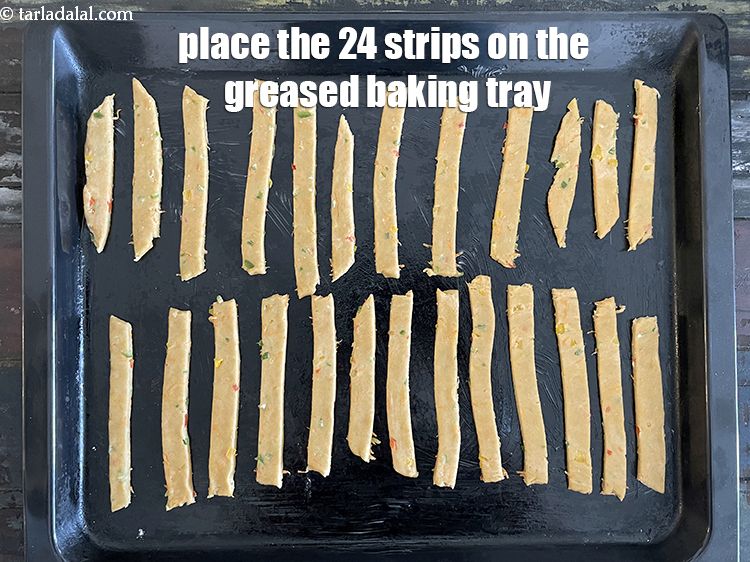Step 20 – <meta charset="UTF-8" /> Place the strips on the baking tray.
