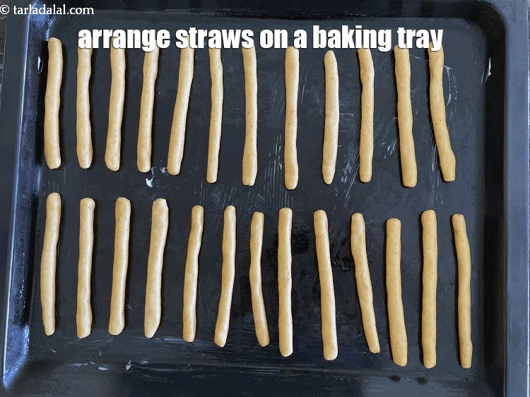 Step 25 – <meta charset="UTF-8" /> Arrange the straws on a greased baking dish.