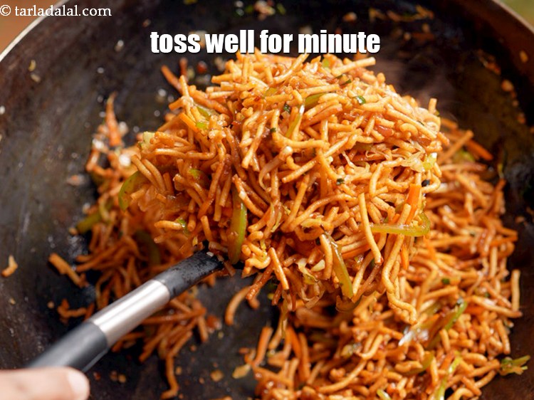 Step 20 – Toss well on high flame for a minute.