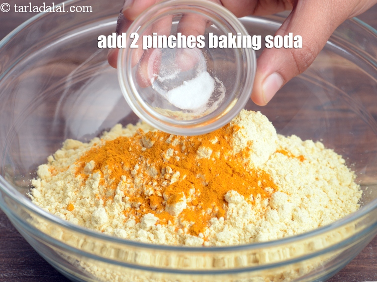 Step 22 – Add 2 pinches <a href="https://www.tarladalal.com/glossary-baking-soda-soda-bi-carb-615i">baking soda</a>.