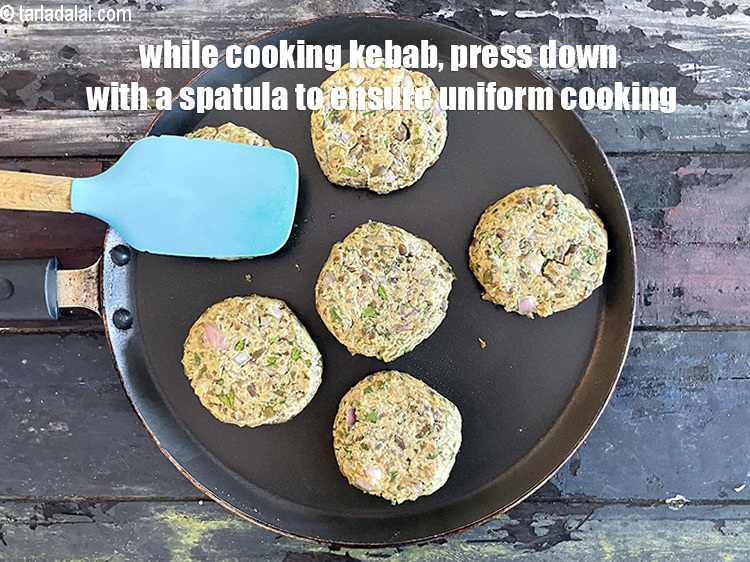 Step 40 – While cooking the kebab press down gently with a spatula to see that even cooking …