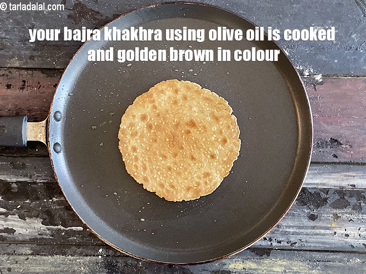 Step 21 – <meta charset="UTF-8" />Your khakhra is cooked and golden brown in colour.&nbsp;Repeat for the remaining to …
