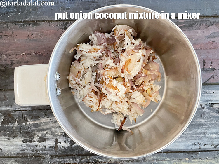 Step 21 – In a mixer, put the sauteed onion coconut mixture.
