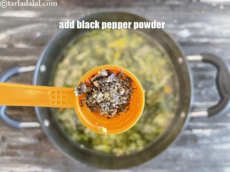 Step 32 – Add black pepper powder to the soup.