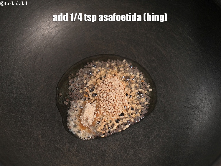 Step 28 – Add&nbsp;1/4&nbsp;tsp&nbsp;<a href="https://www.tarladalal.com/glossary-asafoetida-hing-113i">asafoetida (hing)</a>.