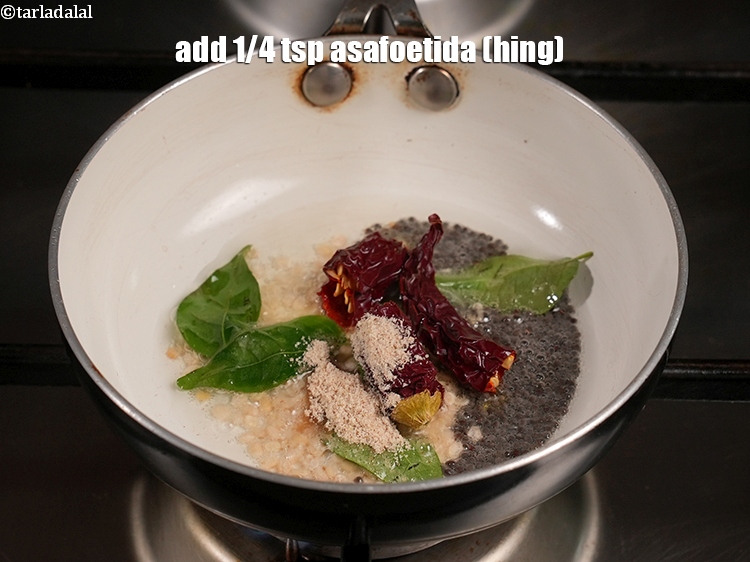 Step 21 – Add&nbsp;<meta charset="UTF-8" />1/4 tsp&nbsp;<a href="glossary-asafoetida-hing-113i">asafoetida (hing)</a>.