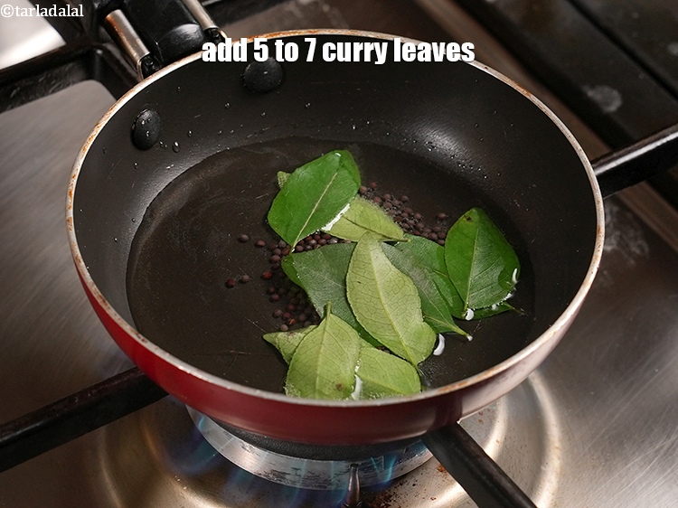 Step 23 – Add 5 to 7 curry leaves.