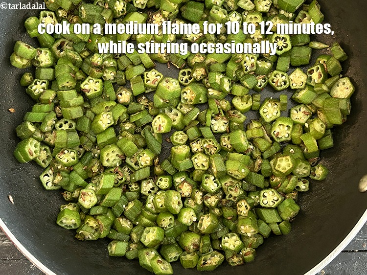 Step 21 – Cook on a medium flame for 10 to 12 minutes, while <strong>stirring</strong>&nbsp;occasionally.